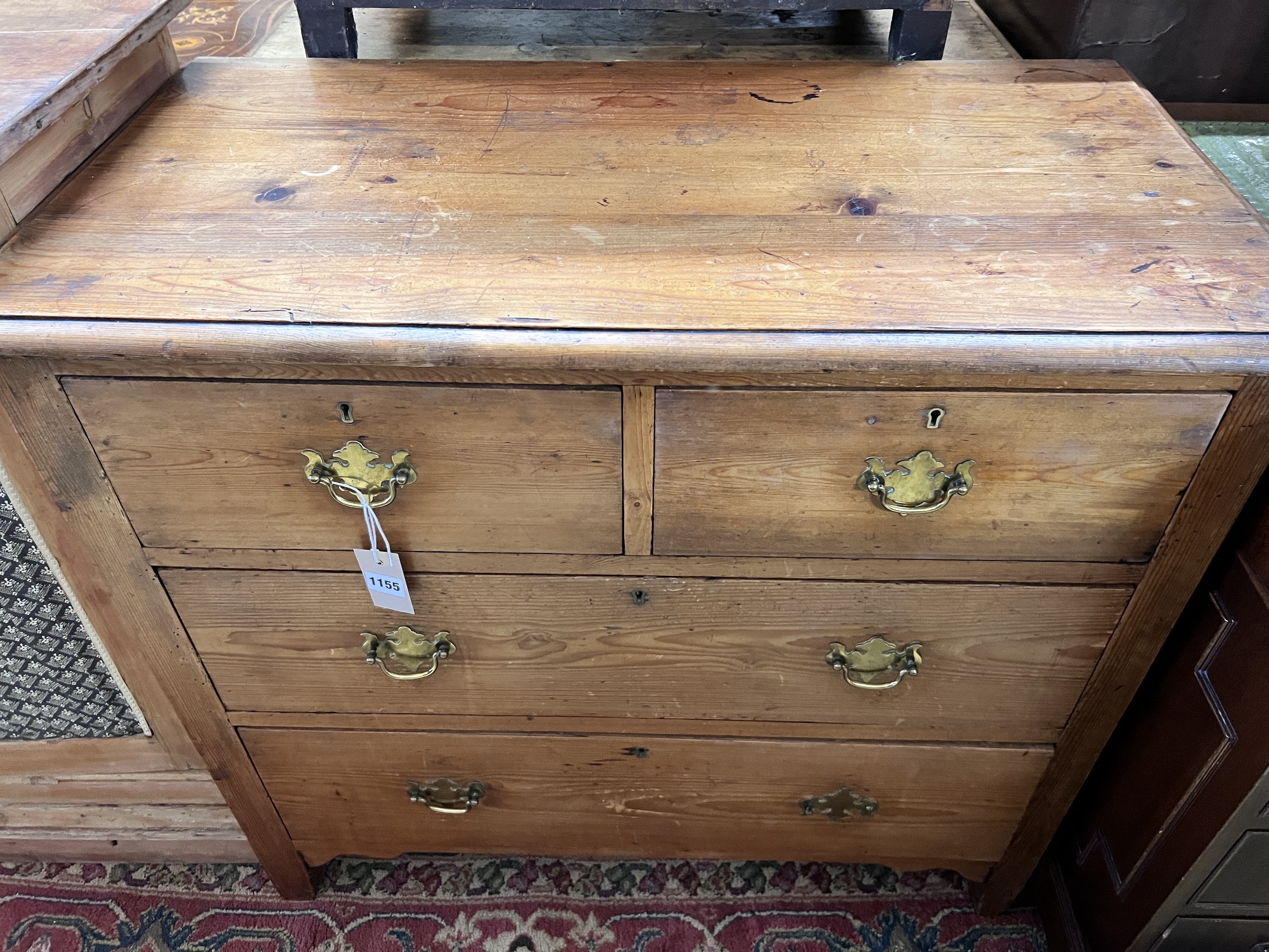 An Edwardian pine chest of four drawers, width 92cm